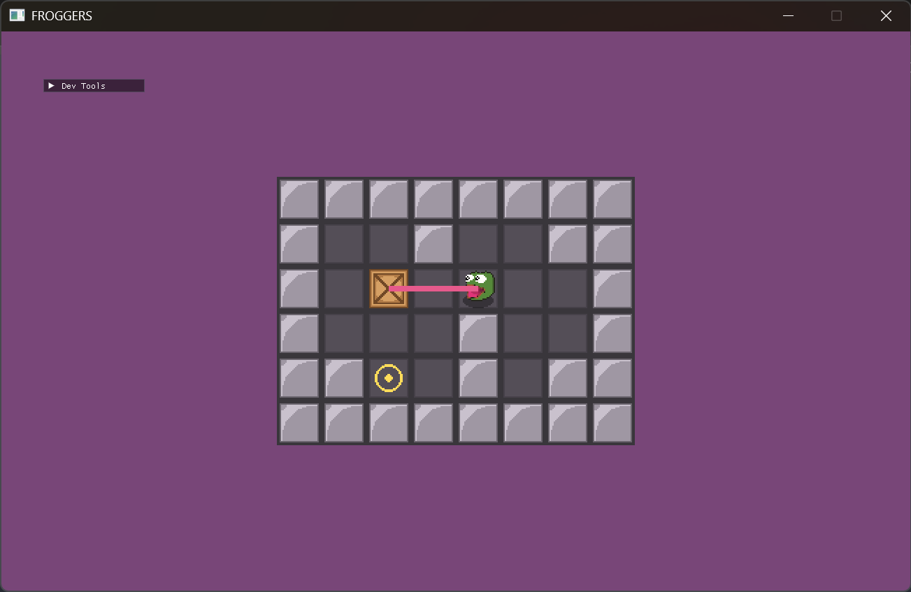 A Froggers dungeon level: the frog's tongue stretches across the stone floor to grab a crate, with a yellow target nearby